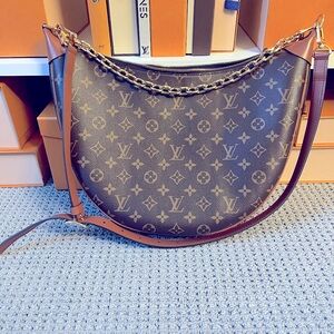 Louis Vuitton Loop Hobo- Like New! Authenticity guaranteed.